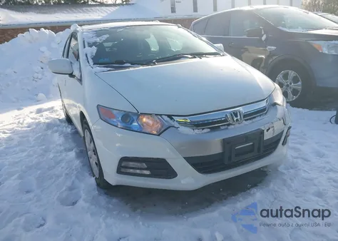2012 Honda Insight from USA, damaged, VIN JHMZE2H37CS005710
